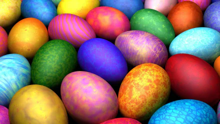 Colorful Easter eggs in various vibrant shades and patterns, creating a festive holiday scene. HD desktop wallpaper and background.