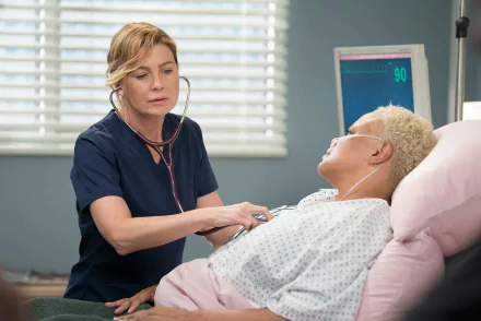 HD wallpaper of a scene from Grey's Anatomy with a nurse checking a patient's vitals in a hospital room.