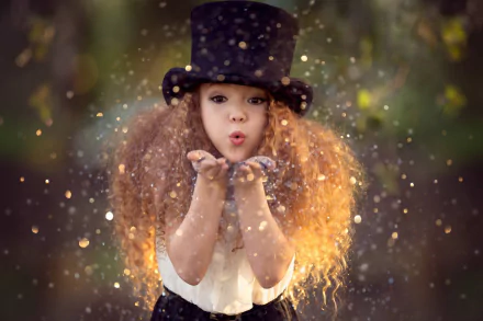 A redhead child with brown eyes wearing a top hat blows sparkling particles in a bokeh-lit background, captured in a high-definition photography style.