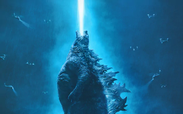 HD desktop wallpaper of Godzilla: King of the Monsters, featuring Godzilla emitting a blue atomic breath into the sky.
