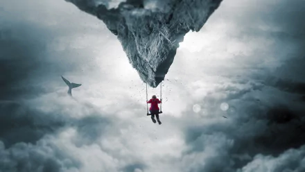 Fantasy dream scene: lone figure in red swings from an upside-down cliff above a sea of clouds, a bird glides nearby — 5K Ultra HD PC desktop wallpaper/background.