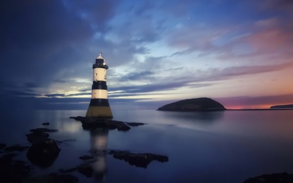 Man Made Lighthouse Night Reflection Ocean Horizon HD Wallpaper | Background Image
