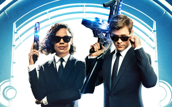 Tessa Thompson Chris Hemsworth movie Men in Black: International HD Desktop Wallpaper | Background Image