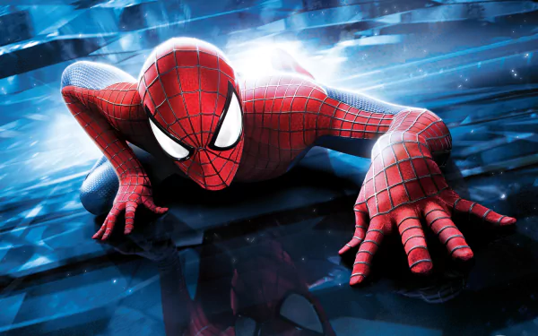 HD desktop wallpaper featuring Spider-Man from the movie The Amazing Spider-Man 2. Spider-Man is in a dynamic crawling pose against a high-energy, blue-toned background.