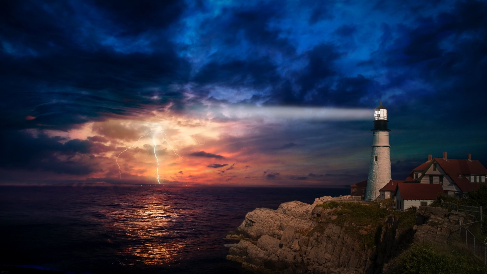 HD desktop wallpaper of a man-made lighthouse casting light over the ocean coastline at sunset beneath a dramatic cloudy sky.