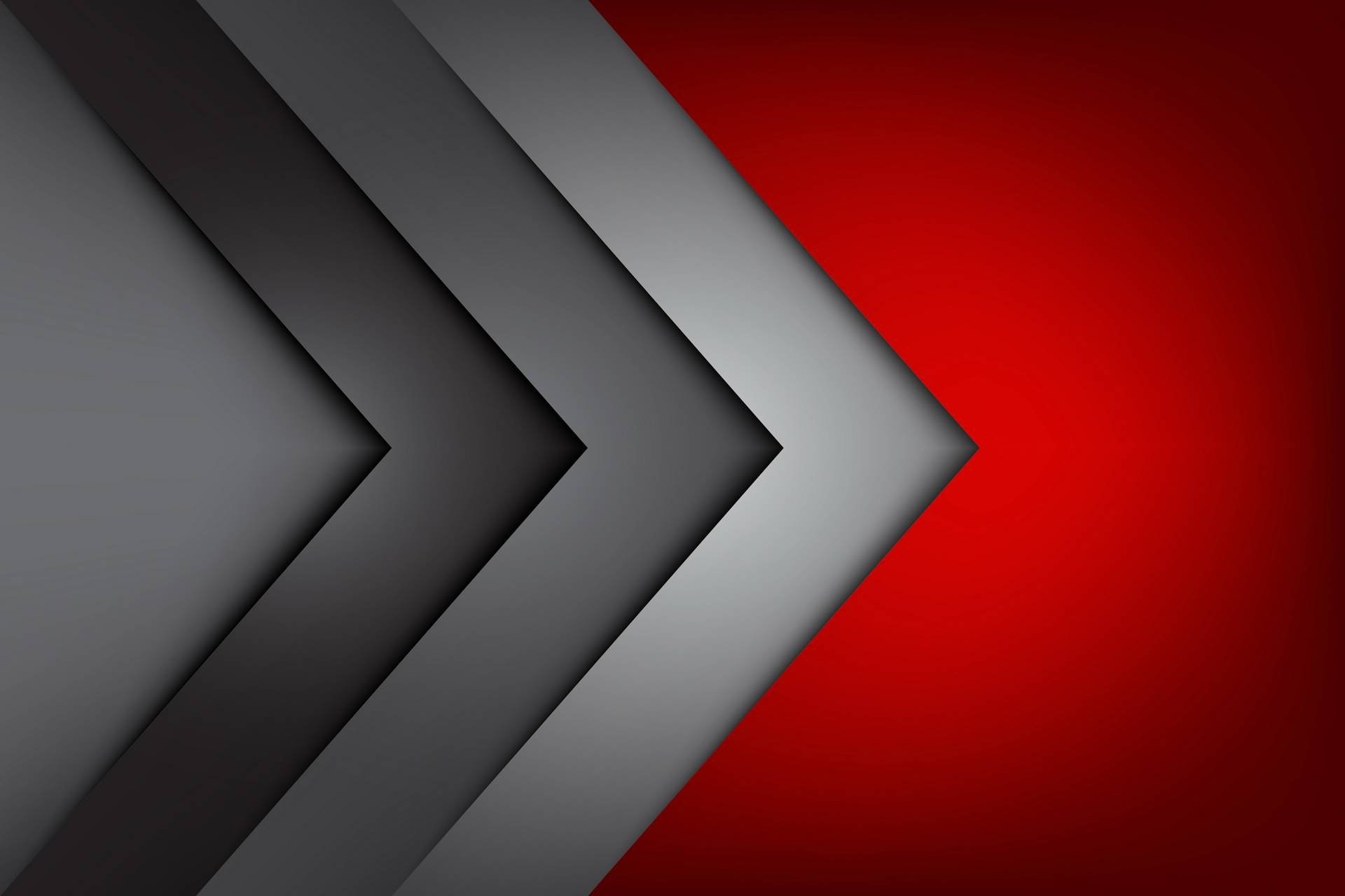 Abstract minimalist HD desktop wallpaper featuring layered geometric arrows in shades of gray pointing right against a bold red background.