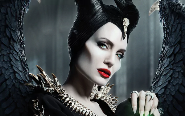 High-resolution 4K Ultra HD wallpaper of Angelina Jolie as Maleficent from the movie Maleficent: Mistress of Evil, featuring her signature dark horned headdress and striking makeup.