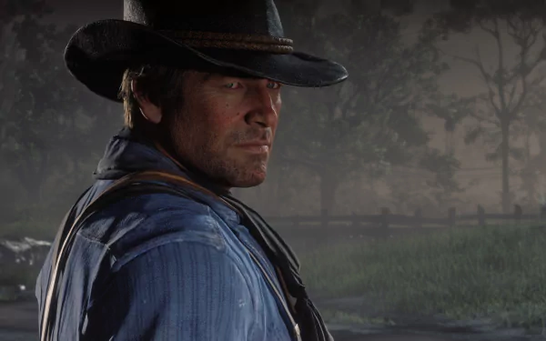 Arthur Morgan from Red Dead Redemption 2 in a detailed 4K Ultra HD PC desktop wallpaper, featuring a moody, foggy outdoor scene.