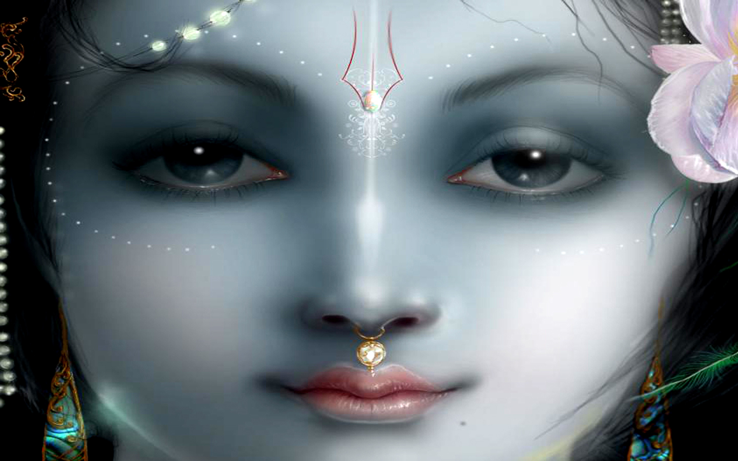 Lord Krishna, a revered deity in Hinduism, depicted in this desktop wallpaper with religious symbolism.