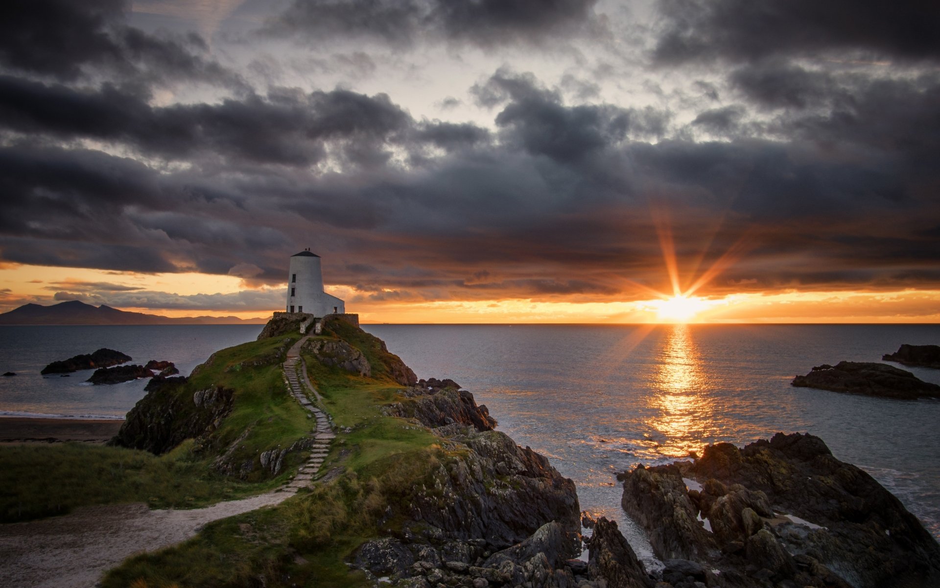 Download Cloud Horizon Ocean Wales Sunset Man Made Lighthouse 4k Ultra HD Wallpaper