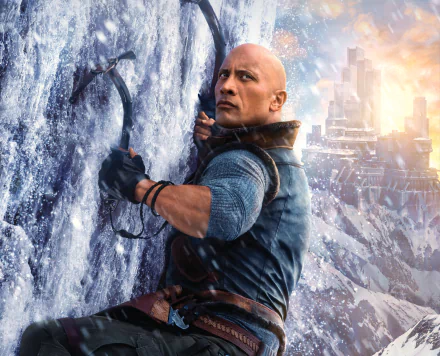 HD PC desktop wallpaper featuring Dwayne Johnson climbing an icy mountain scene from the movie Jumanji: The Next Level.