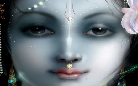 HD desktop wallpaper featuring the serene face of a Hindu deity, adorned with subtle jewelry and a delicate flower, embodying tranquility and devotion in Hinduism.