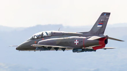 Soko G-4 Super Galeb of the Serbian Air Force in flight, a military jet trainer/light-attack; high-res 2K Quad HD PC desktop wallpaper background.