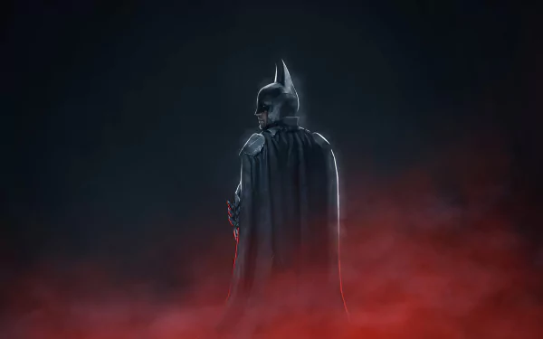 HD desktop wallpaper of Robert Pattinson as Batman in The Batman movie, featuring Batman standing amid dark red smoke with a dark, shadowy background.