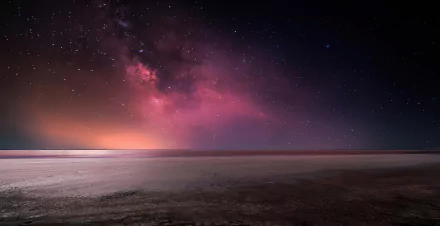 2K Quad HD sci-fi wallpaper: Milky Way and pink nebula over Crimea's Syvash lagoon, star-filled sky mirrored on the quiet shoreline.