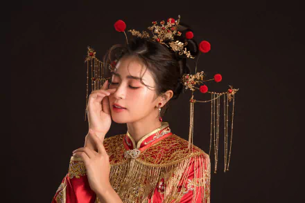 Portrait of an Asian brunette woman wearing an ornate headdress and traditional attire, exuding a serene mood in this 4K Ultra HD desktop wallpaper.