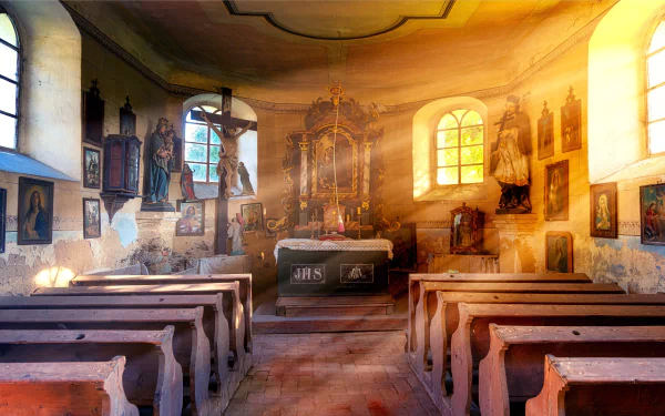 Religious church interior with worn wooden pews, sunbeams through arched windows illuminating an ornate altar and crucifix — 5K Ultra HD PC desktop wallpaper and background.
