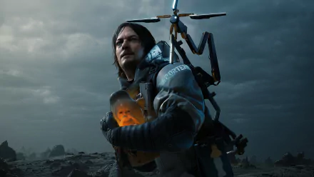 Sam Porter Bridges from the video game Death Stranding stands against a dark, stormy sky in this 4K Ultra HD PC desktop wallpaper.