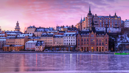  Sunrise reflected in the frozen water of lake Malaren, Stockholm, Sweden