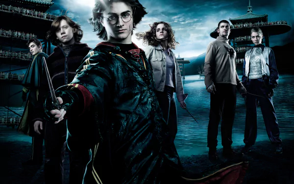 4K Ultra HD desktop wallpaper featuring Ron Weasley, Hermione Granger, and Harry Potter from the movie Harry Potter and the Goblet of Fire in a dark, dramatic scene.