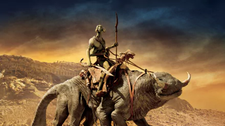 8K Ultra HD desktop wallpaper featuring a scene from the movie John Carter, showing a warrior riding a large, horned beast against a dramatic desert landscape.