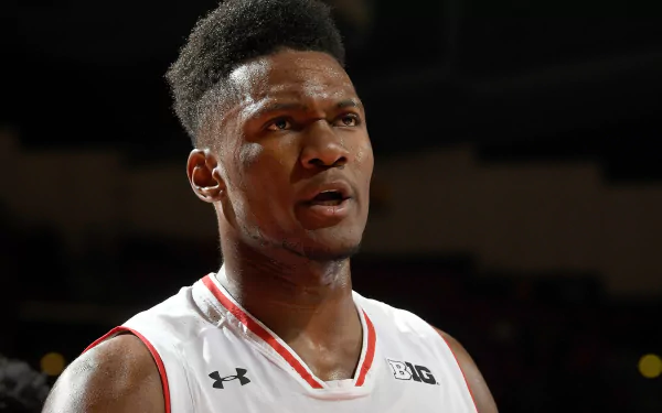 HD desktop wallpaper featuring an intense close-up of basketball player Bruno Fernando in a game setting.