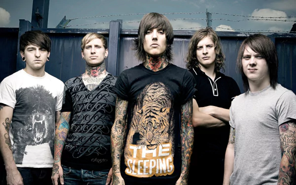 HD desktop wallpaper of Bring Me The Horizon band members standing together against an industrial backdrop.