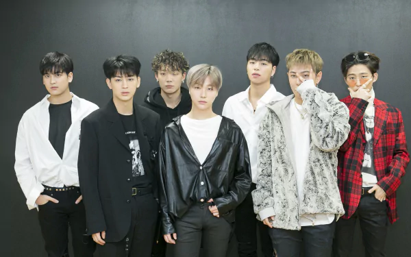 HD wallpaper featuring the K-pop group iKON, with seven members posing for a stylish group photo.