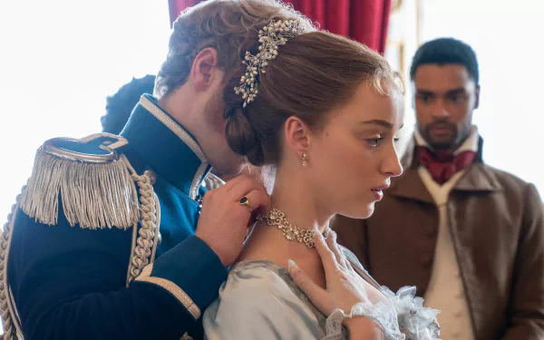 HD wallpaper of a scene from Bridgerton featuring a man in uniform tenderly fastening a necklace on a woman in a regal dress.
