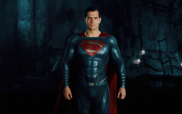 Henry Cavill as Superman in a dark, atmospheric 4K Ultra HD Justice League (2017) movie wallpaper, showcasing the iconic superhero in full costume.