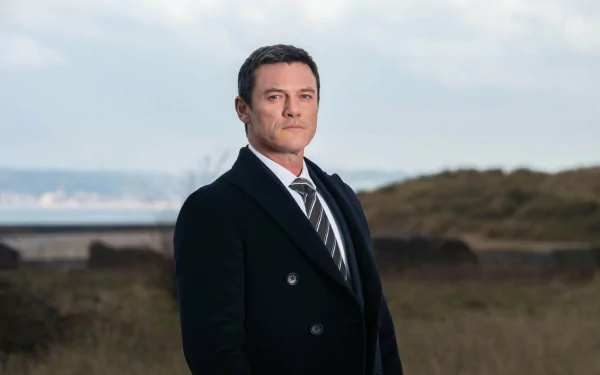 HD desktop wallpaper featuring actor from The Pembrokeshire Murders set against a scenic backdrop.