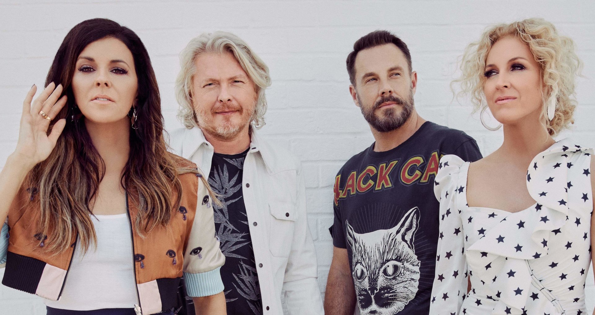 HD desktop wallpaper of Little Big Town posing together against a white background for fans.
