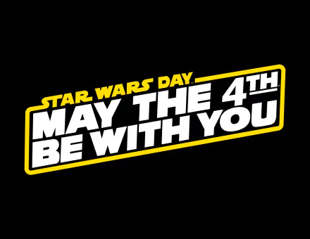 HD desktop wallpaper featuring the text Star Wars Day. May the 4th Be With You in bold yellow and white font on a black background, celebrating Star Wars Day.