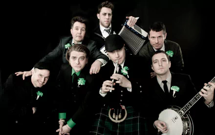 Dropkick Murphys band members posing for HD desktop wallpaper with traditional Celtic instruments and attire.
