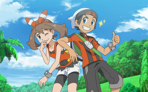 HD PC desktop wallpaper featuring blue-eyed Pokémon characters Brendan and May from Omega Ruby and Alpha Sapphire, smiling with hats against a vibrant outdoor background.
