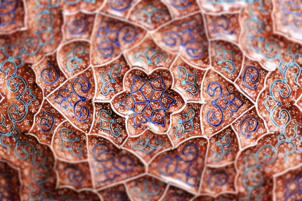 Intricate abstract fractal design in rich earth tones and blue accents, rendered in 4K Ultra HD for a detailed PC desktop wallpaper and background.