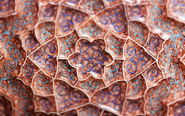 Intricate abstract fractal design in rich earth tones and blue accents, rendered in 4K Ultra HD for a detailed PC desktop wallpaper and background.