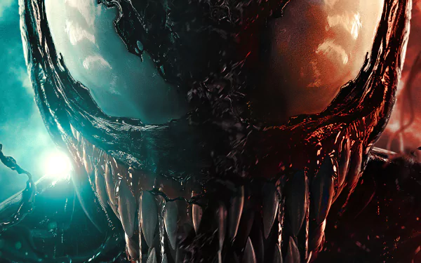 2K Quad HD desktop wallpaper: close-up of Venom's snarling symbiote face from the Marvel movie Venom: Let There Be Carnage, glossy black skin, white eyes and razor teeth.