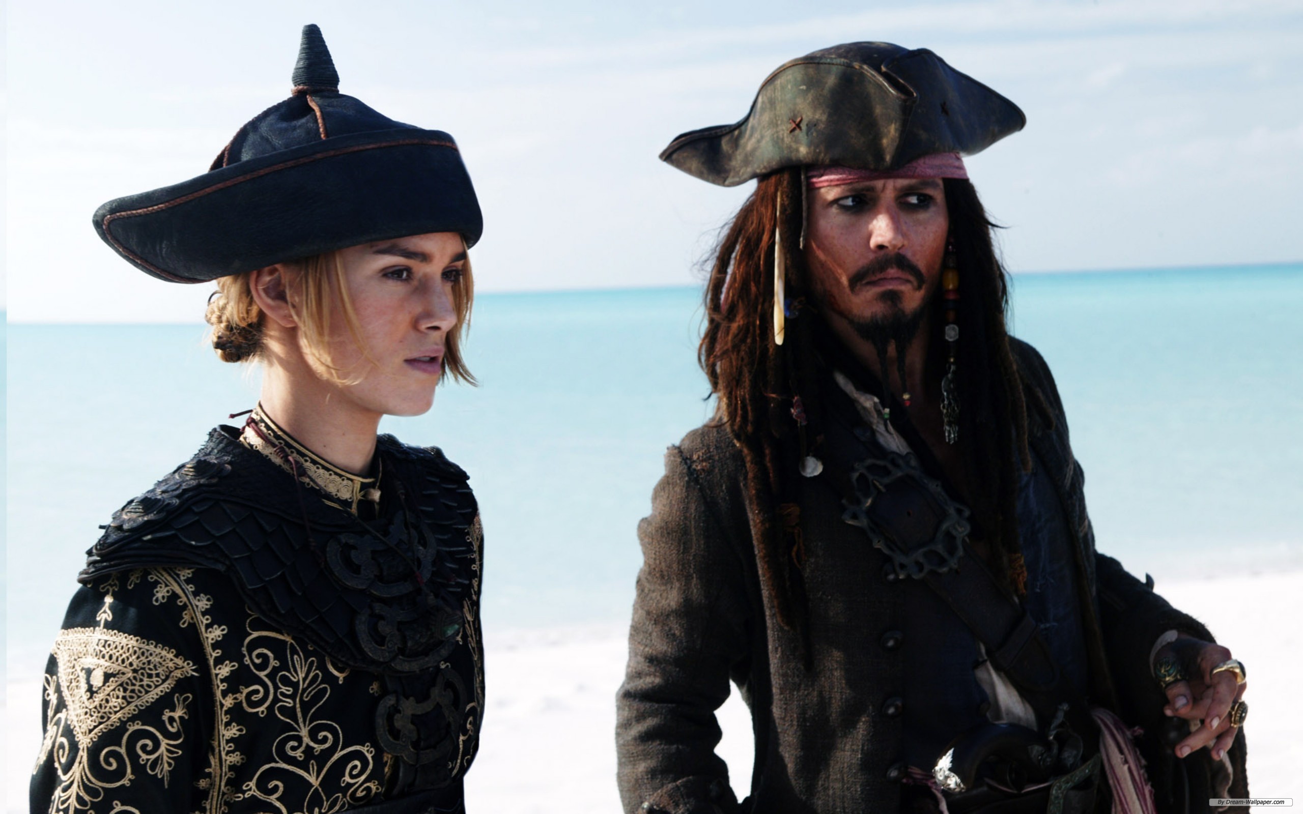 Captain Jack Sparrow and Elizabeth Swann in Pirates of the Caribbean: At World's End wallpaper.