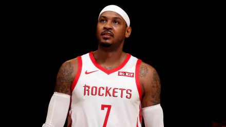 HD wallpaper featuring a basketball player in a white Rockets jersey number 7, posing against a dark background for desktop.