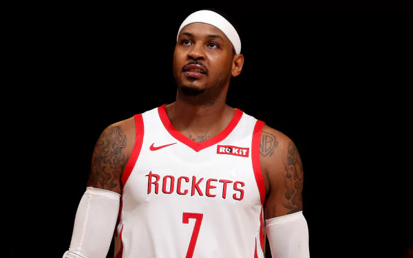 HD wallpaper featuring a basketball player in a white Rockets jersey number 7, posing against a dark background for desktop.