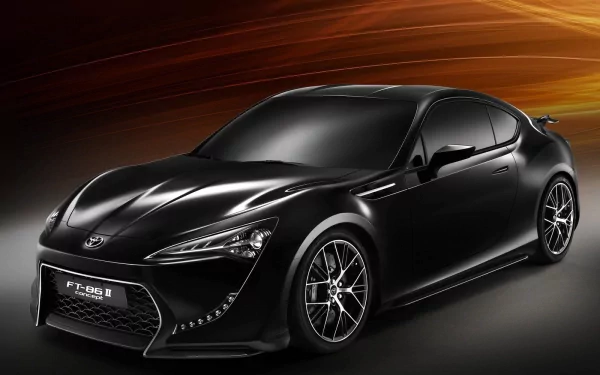 Sleek black Toyota FT-86 concept car showcased in a high-definition desktop wallpaper, highlighting its sporty design and dynamic curves.