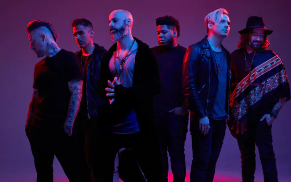 HD desktop wallpaper of the band Daughtry with Chris Daughtry, posing dramatically against a vibrant purple background.