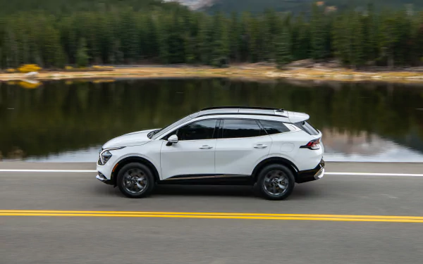 SUV vehicle Kia Sportage SX HD Desktop Wallpaper | Background Image