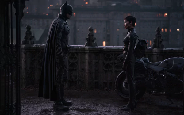 4K Ultra HD wallpaper featuring Batman (Robert Pattinson) and Catwoman (Zoë Kravitz) from the movie The Batman in a dark, atmospheric city setting.