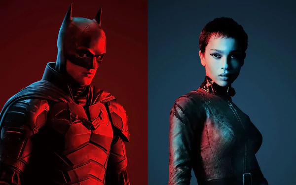 HD wallpaper featuring Robert Pattinson as Batman and Zoë Kravitz as Catwoman from the movie The Batman, showcasing striking red and blue lighting.