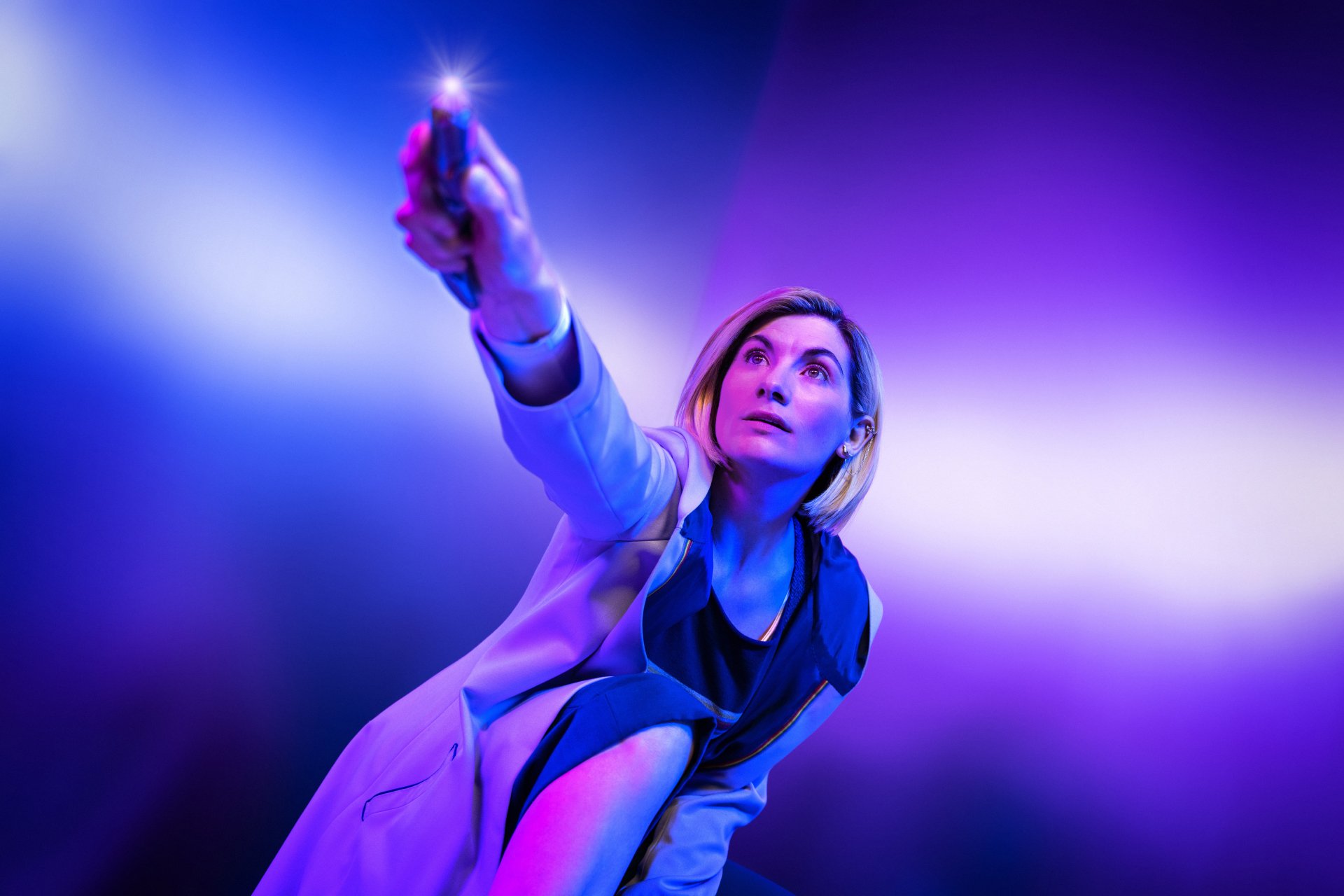 The Thirteenth Doctor, portrayed by Jodie Whittaker, is featured in this vibrant 4K Ultra HD wallpaper from the TV show Doctor Who (2005).