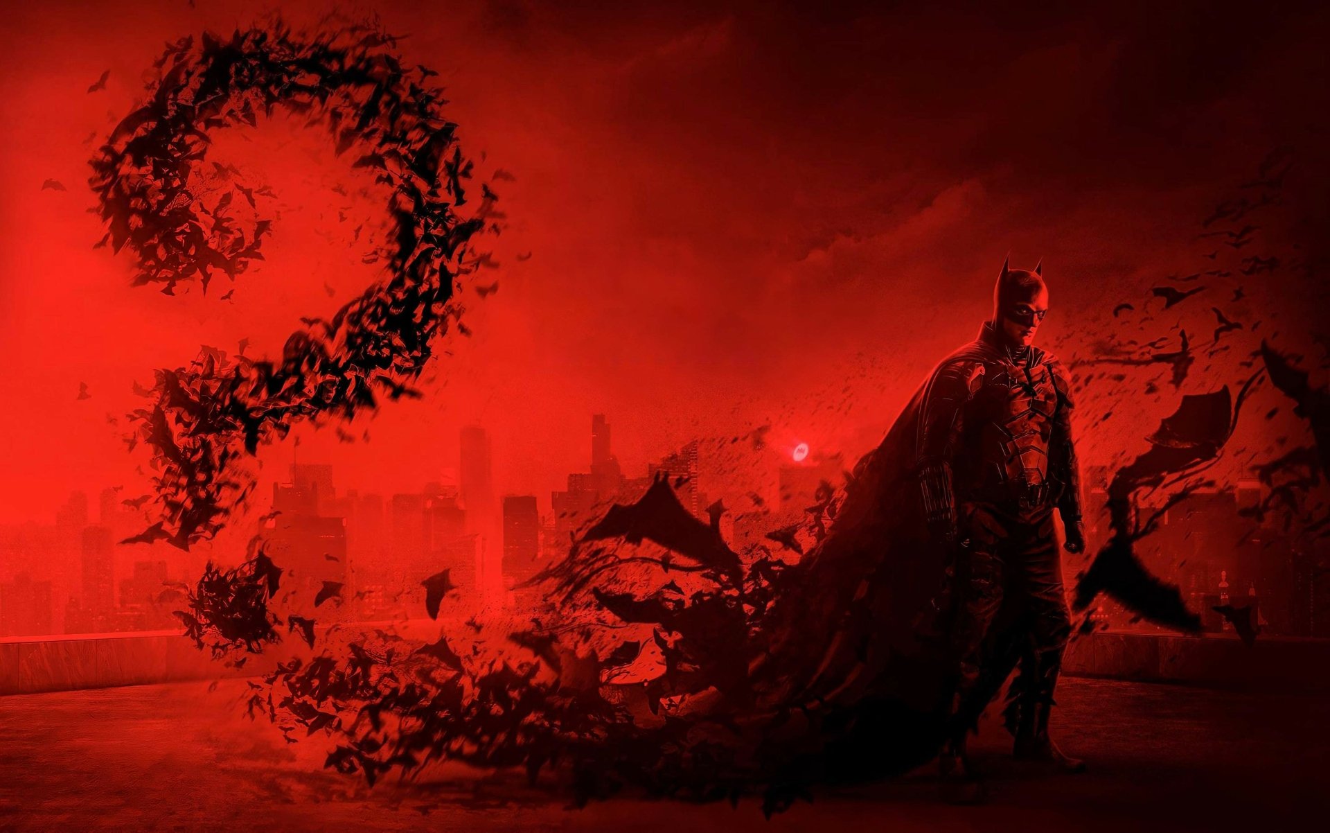 A 4K Ultra HD PC desktop wallpaper featuring Batman from DC Comics' The Batman movie, standing in a dark red cityscape with a swirling question mark shape.