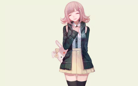 Anime-style HD PC desktop wallpaper featuring a cheerful Danganronpa character with pink hair, wearing a school uniform and holding a bunny-shaped bag.