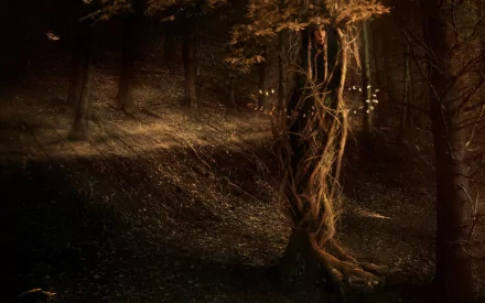 A mystical dryad entwined with a tree in a dark forest, blending fantasy and fairy elements in this HD PC desktop wallpaper.